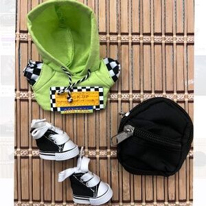 Stylish Green Labubu Hoodie with Black Sneakers and Black Backpack